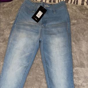 Light blue wash jeans, size 3, never worn